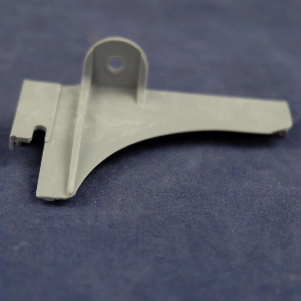 Rögzítő elem, bal (eredeti) ARISTON mosogatógép / RENDELÉSRE