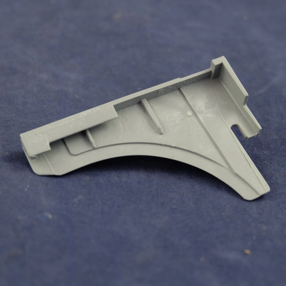 Rögzítő elem, bal (eredeti) ARISTON mosogatógép / RENDELÉSRE