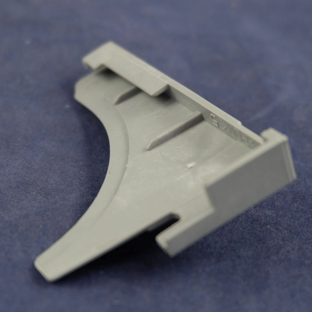 Rögzítő elem, bal (eredeti) ARISTON mosogatógép / RENDELÉSRE